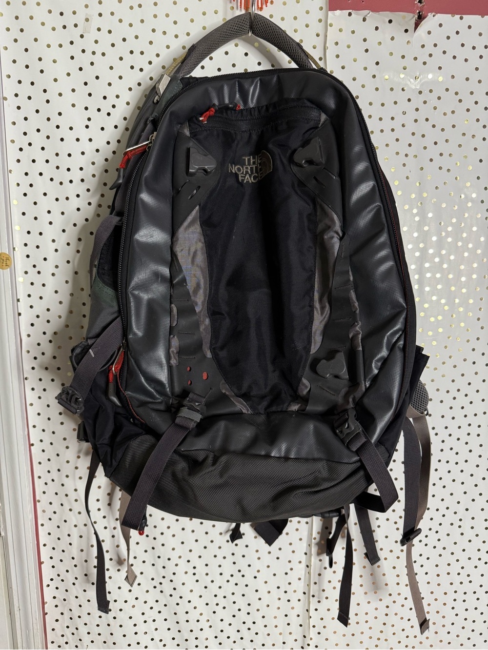 The North Face Black and Gray Men's Backpack with Red Accents